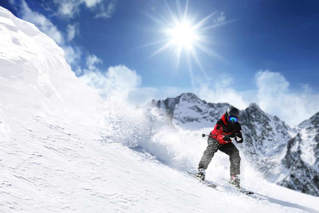 Man Skiing down Slope